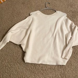 White woman’s sweater